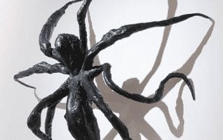 Sculpture of a spider mounted on a wall, part of Louise Bourgeois exhibition at the Burton art gallery